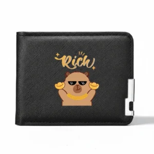 Sleek black textured bi-fold wallet featuring a "Rich" capybara wearing sunglasses, showing the silver metal clip detail and black interior.
