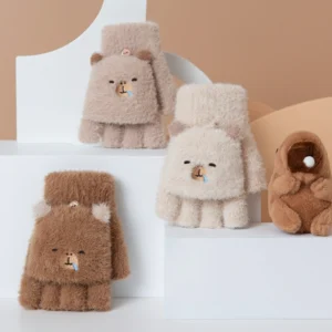 Close-up of fluffy convertible fingerless gloves featuring an embroidered sleeping capybara face with a blue nose bubble, shown in beige and brown colors.