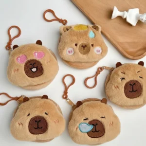 Set of 5 mini plush capybara head coin purses featuring different embroidered expressions including heart eyes, sleeping bubble, and yellow duck.