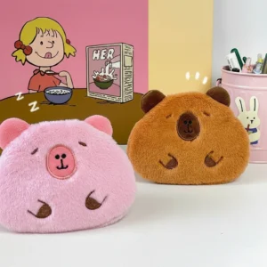 A flat plush capybara purse shown in classic brown and pastel pink colors, measuring 13x10cm, displayed with coins and accessories.